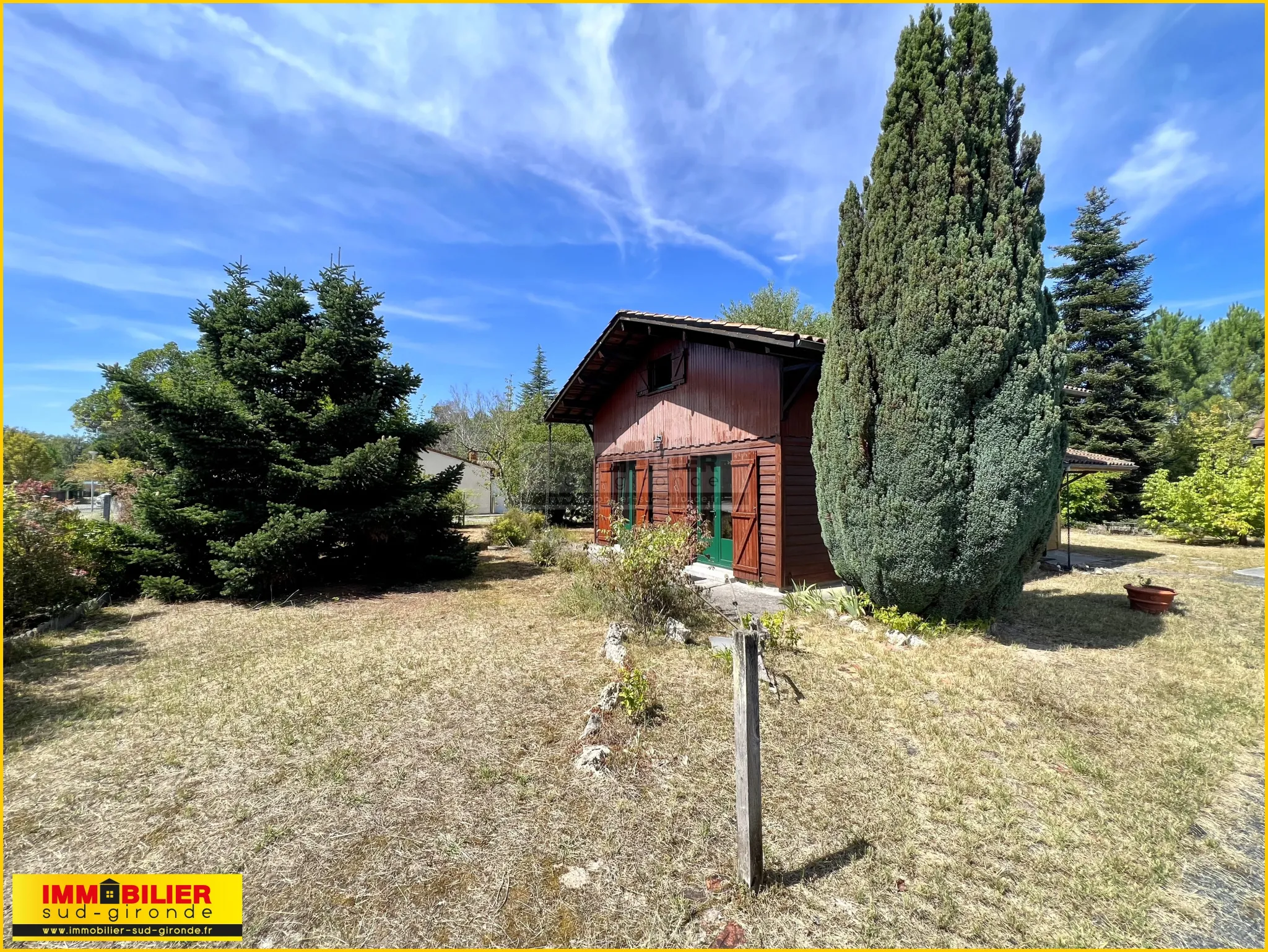 Chalet en bois avec garage à vendre à Saint-Michel de Rieufret 