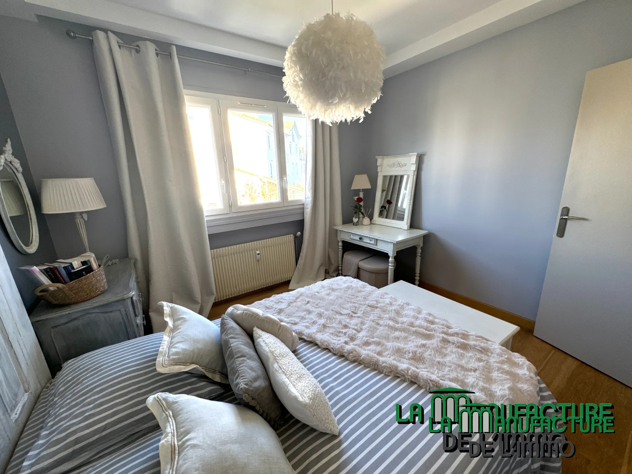 À vendre : Appartement F4 lumineux à Saint-Étienne, dernier étage avec balcon et garage 