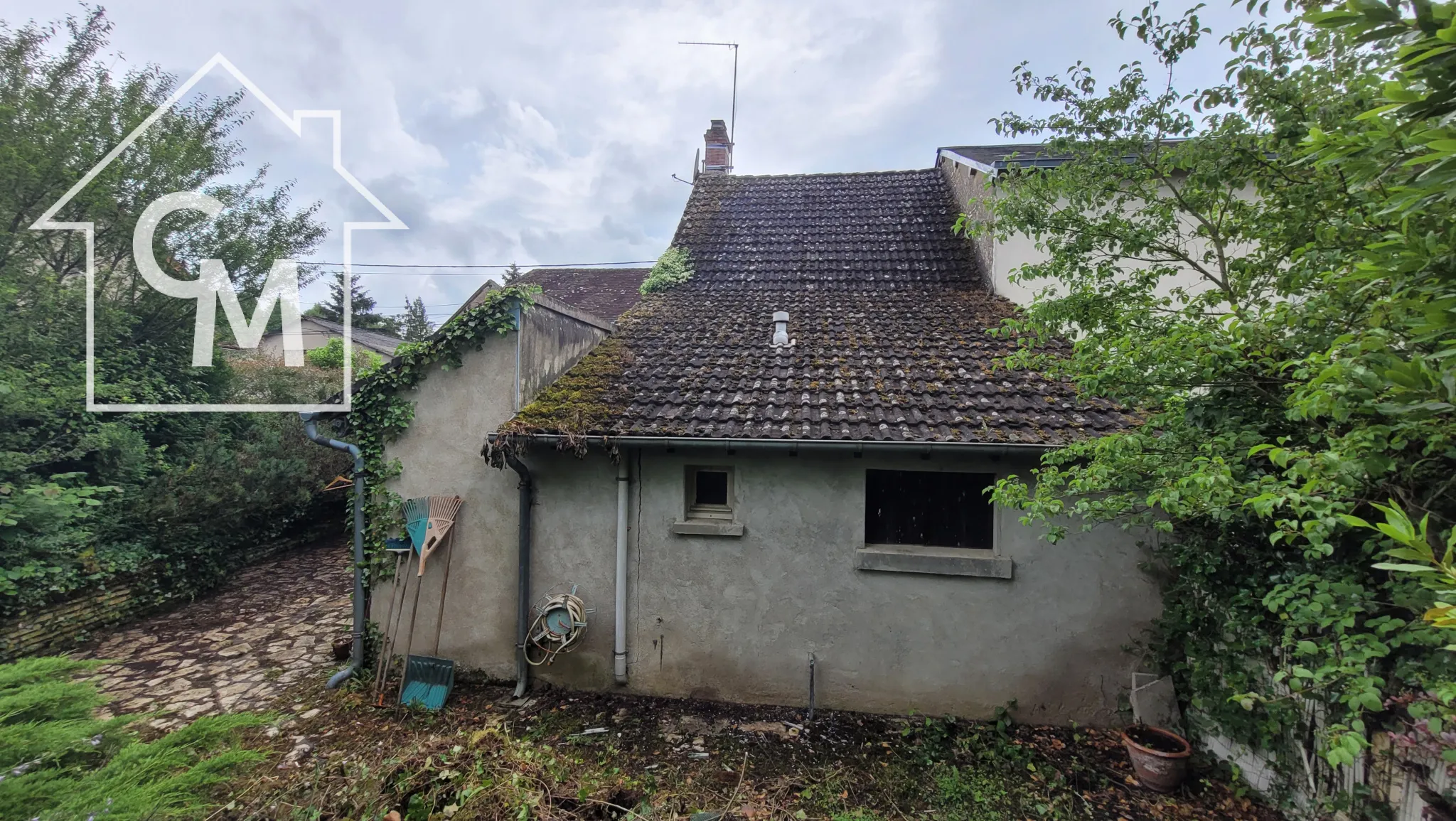 Maison de ville avec jardin et garage à Buzançais 