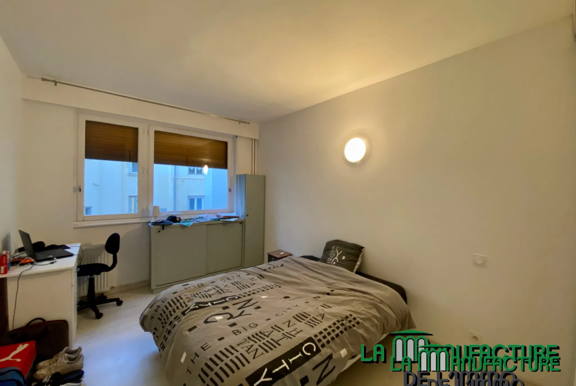 Appartement traversant lumineux à Saint-Étienne - Hypercentre 