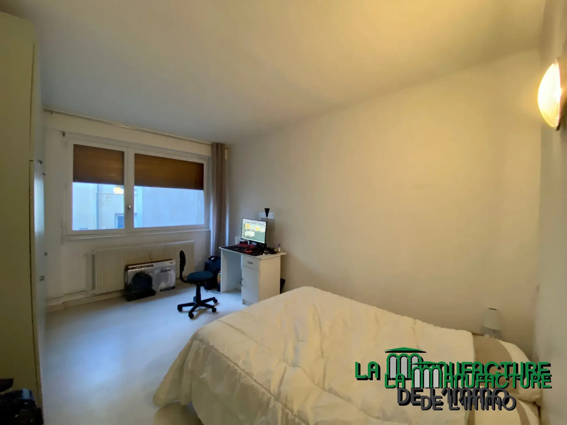 Appartement traversant lumineux à Saint-Étienne - Hypercentre 