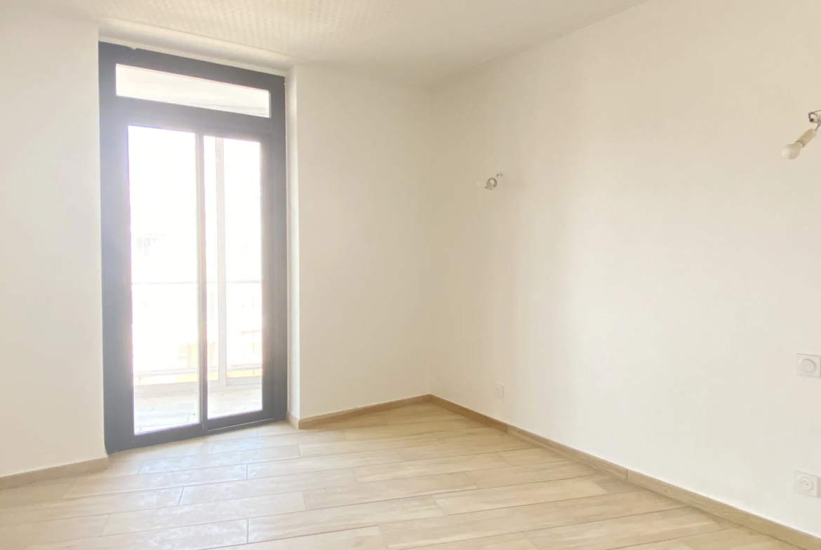 À vendre : Appartement T4 rénové avec vue sur les Quais à Perpignan 