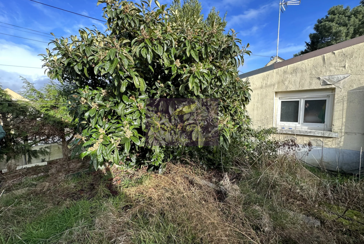 Maison de ville au Mans sud avec garage et jardin 