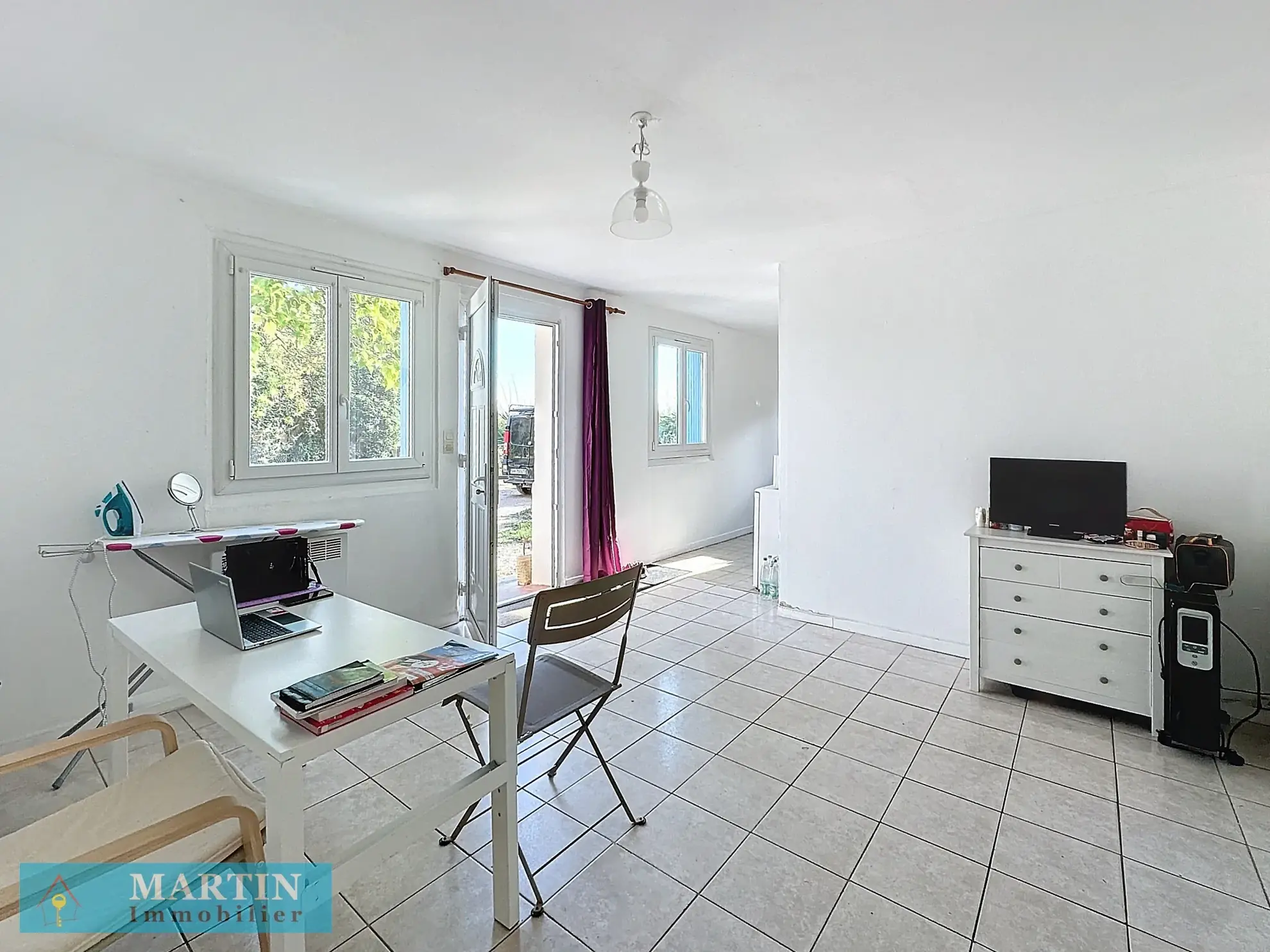 Vente d'un appartement T2 avec jardinet et place de parking à Ceret 