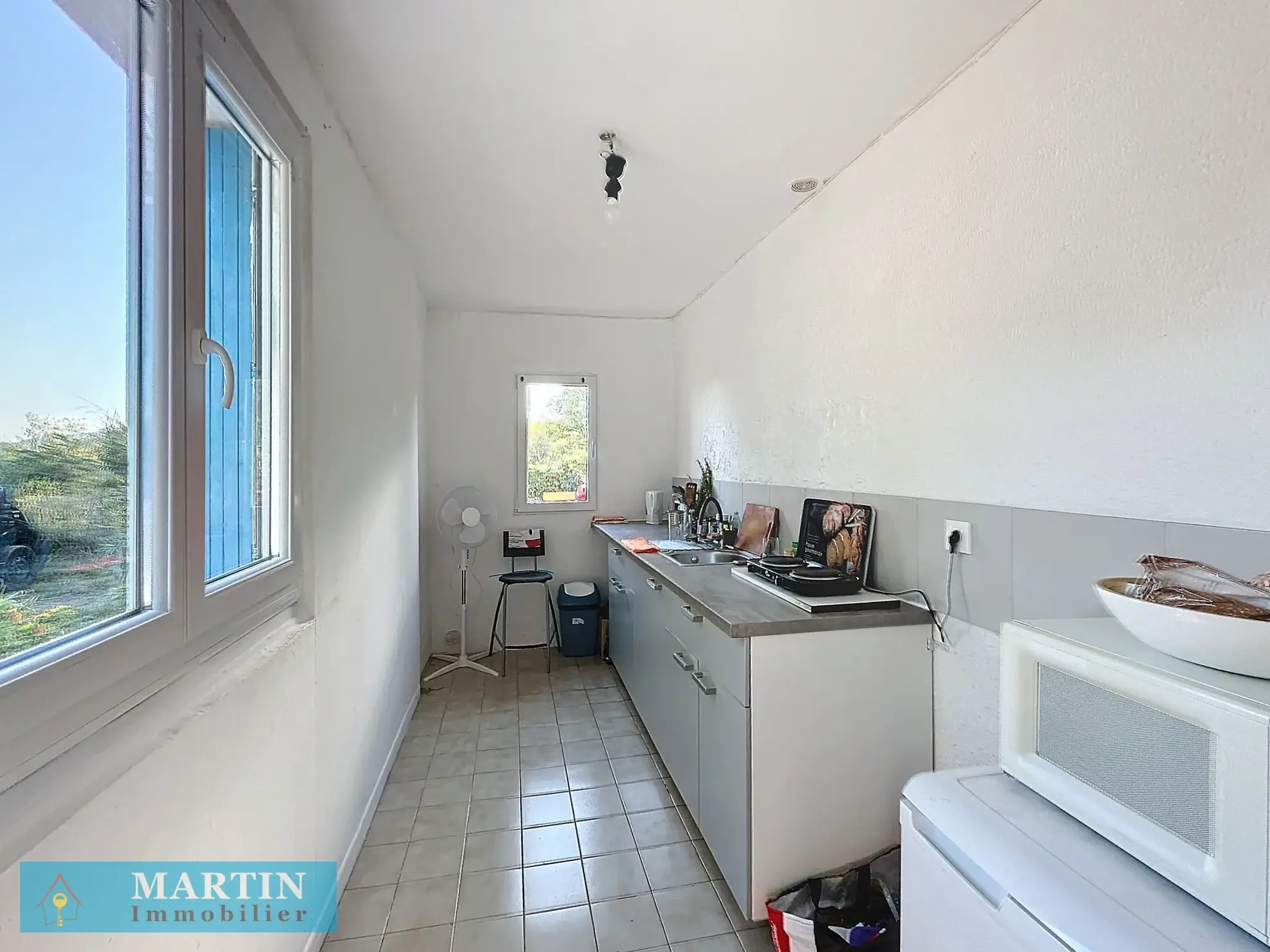 Vente d'un appartement T2 avec jardinet et place de parking à Ceret 