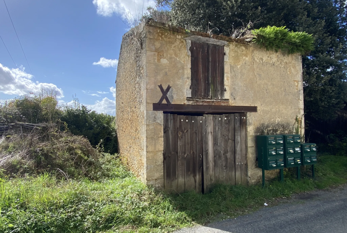 Maison de village en pierre à rénover à Ste Croix du Mont 