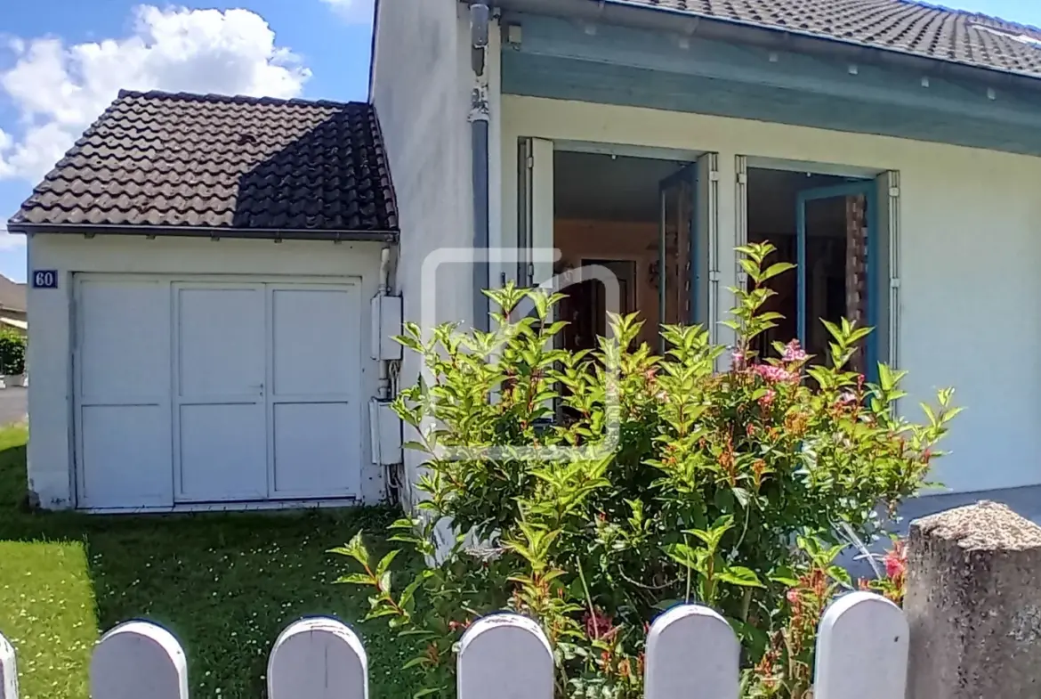 Maison spacieuse à Brive avec 5 chambres et jardin 