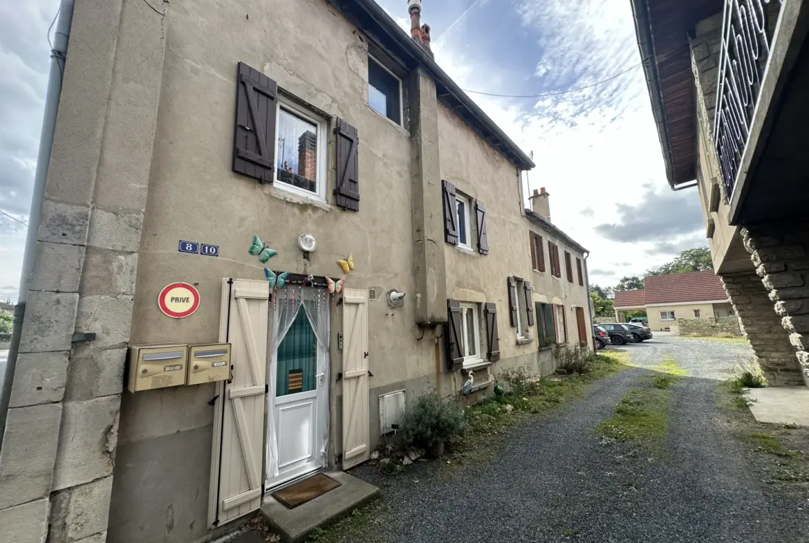 Ensemble immobilier à vendre à Gannat avec maisons et garages 