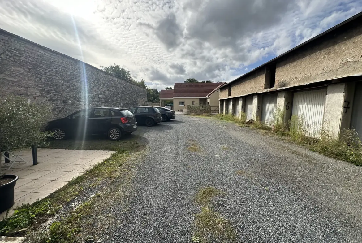 Ensemble immobilier à vendre à Gannat avec maisons et garages 