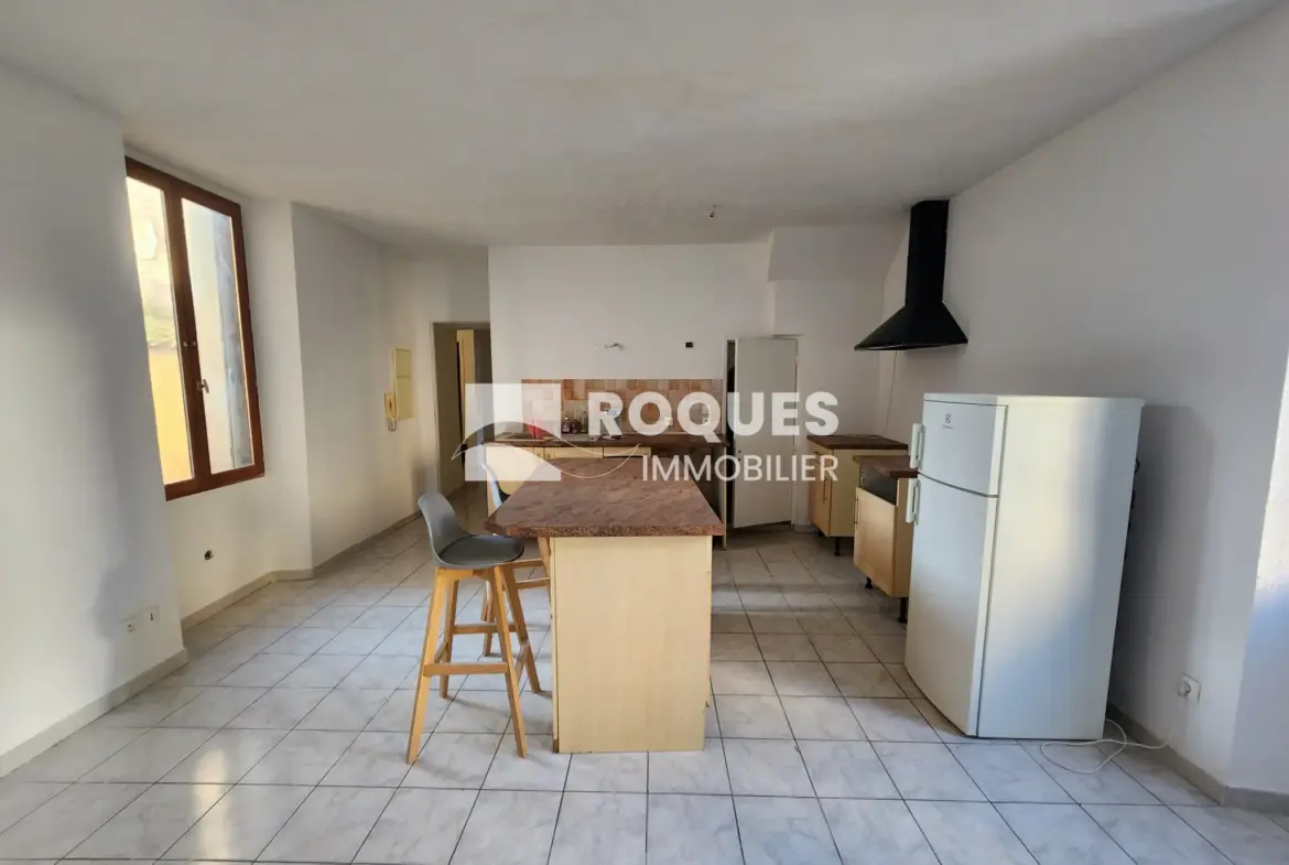 À vendre : Appartement T4 au centre de Lodève avec terrasse 