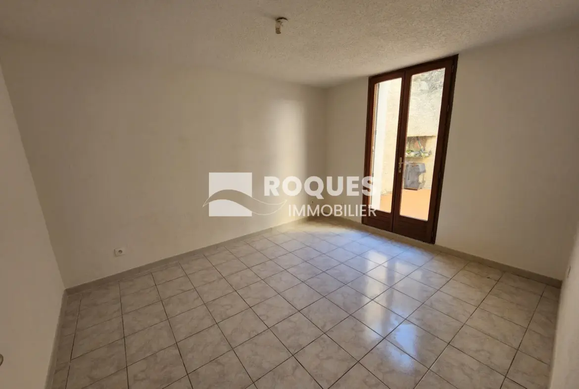 À vendre : Appartement T4 au centre de Lodève avec terrasse 