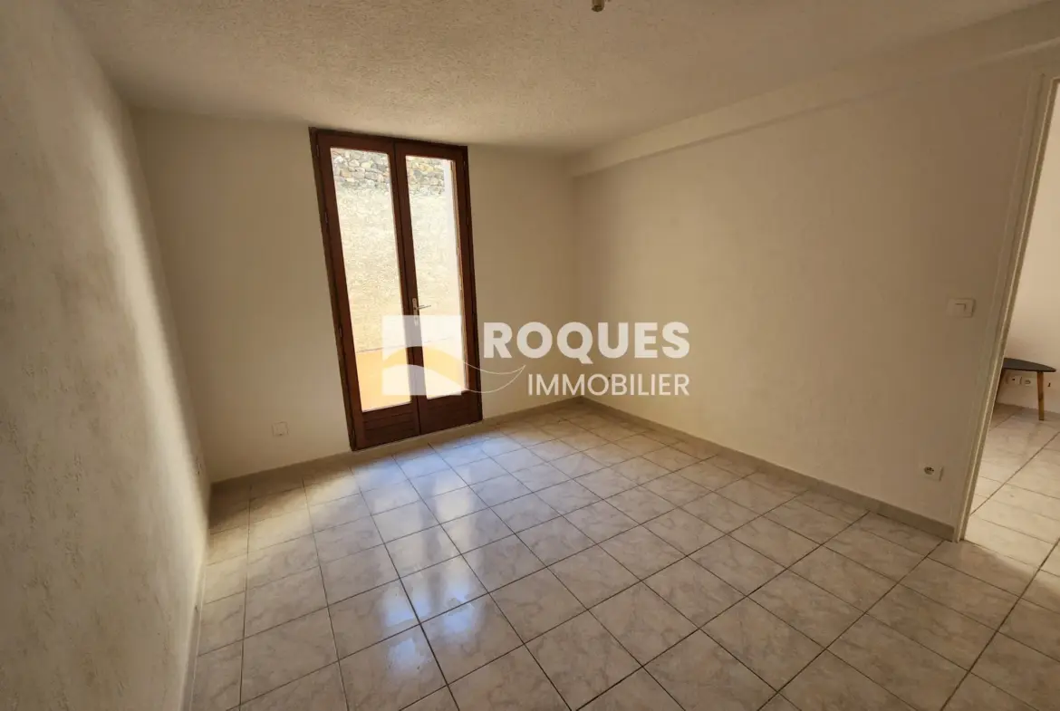 À vendre : Appartement T4 au centre de Lodève avec terrasse 