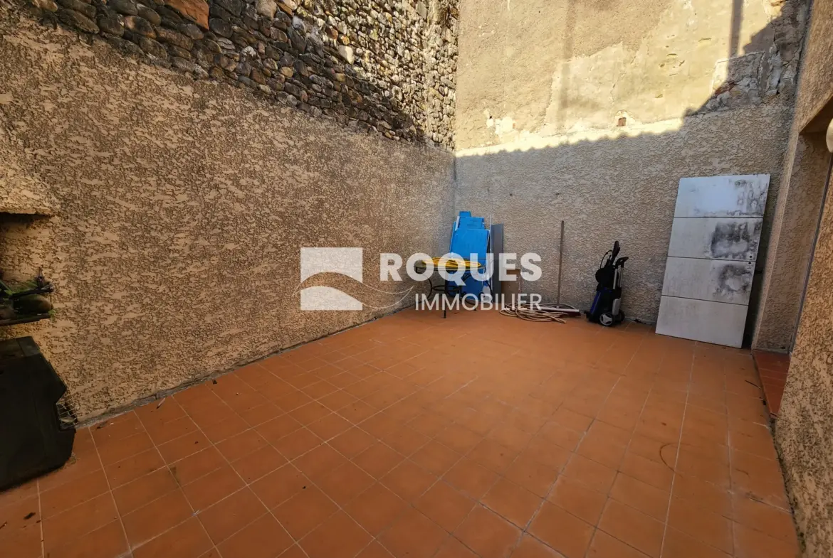 À vendre : Appartement T4 au centre de Lodève avec terrasse 