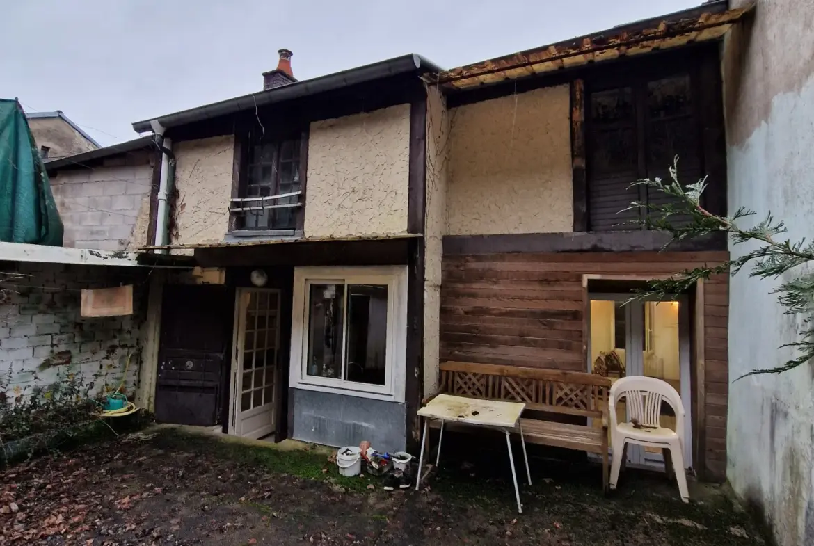 Maison de ville à rénover à Bourbonne-les-Bains 