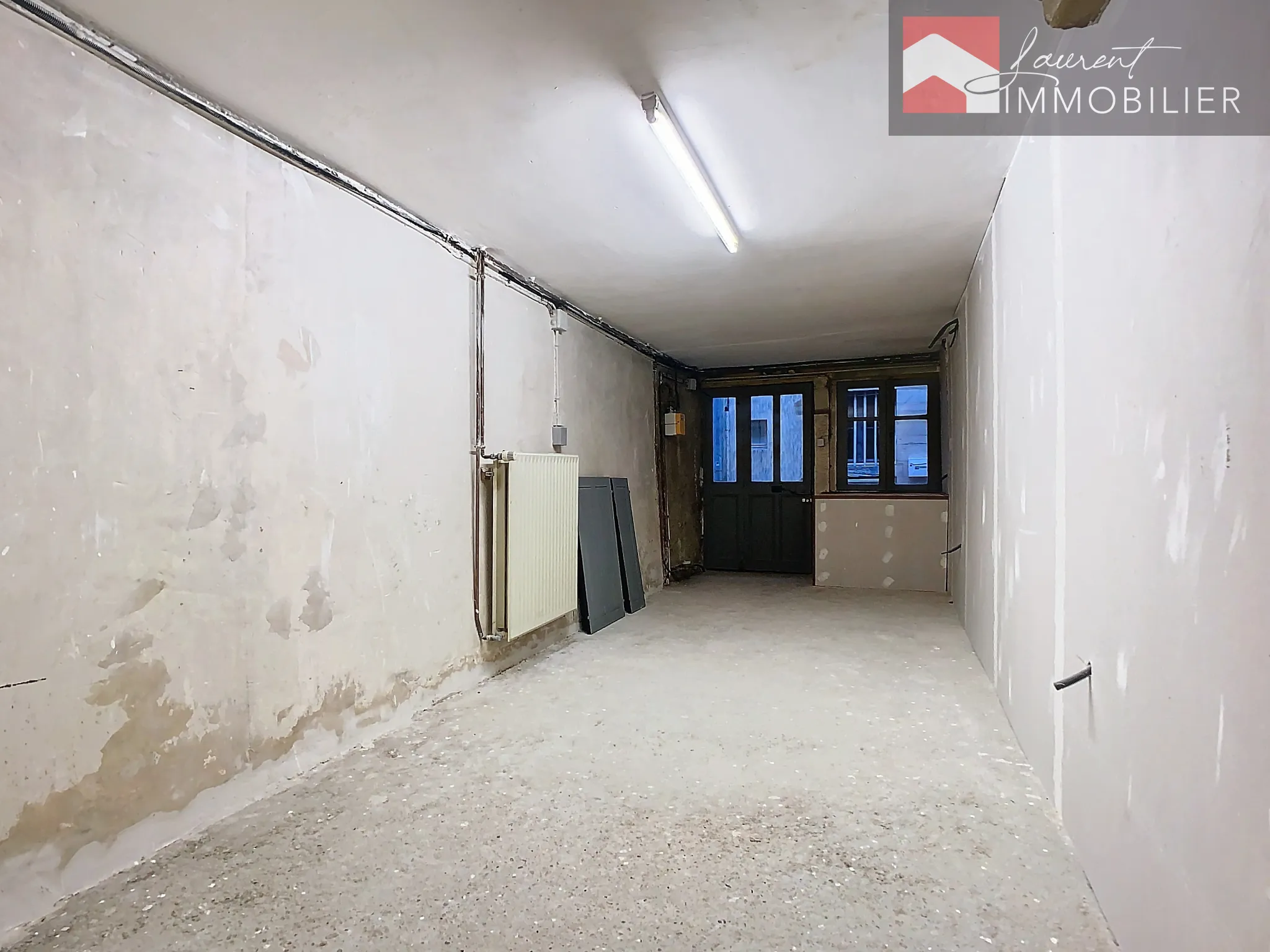 À Tournus, maison de ville en vente avec 5 pièces à 135 000 € 