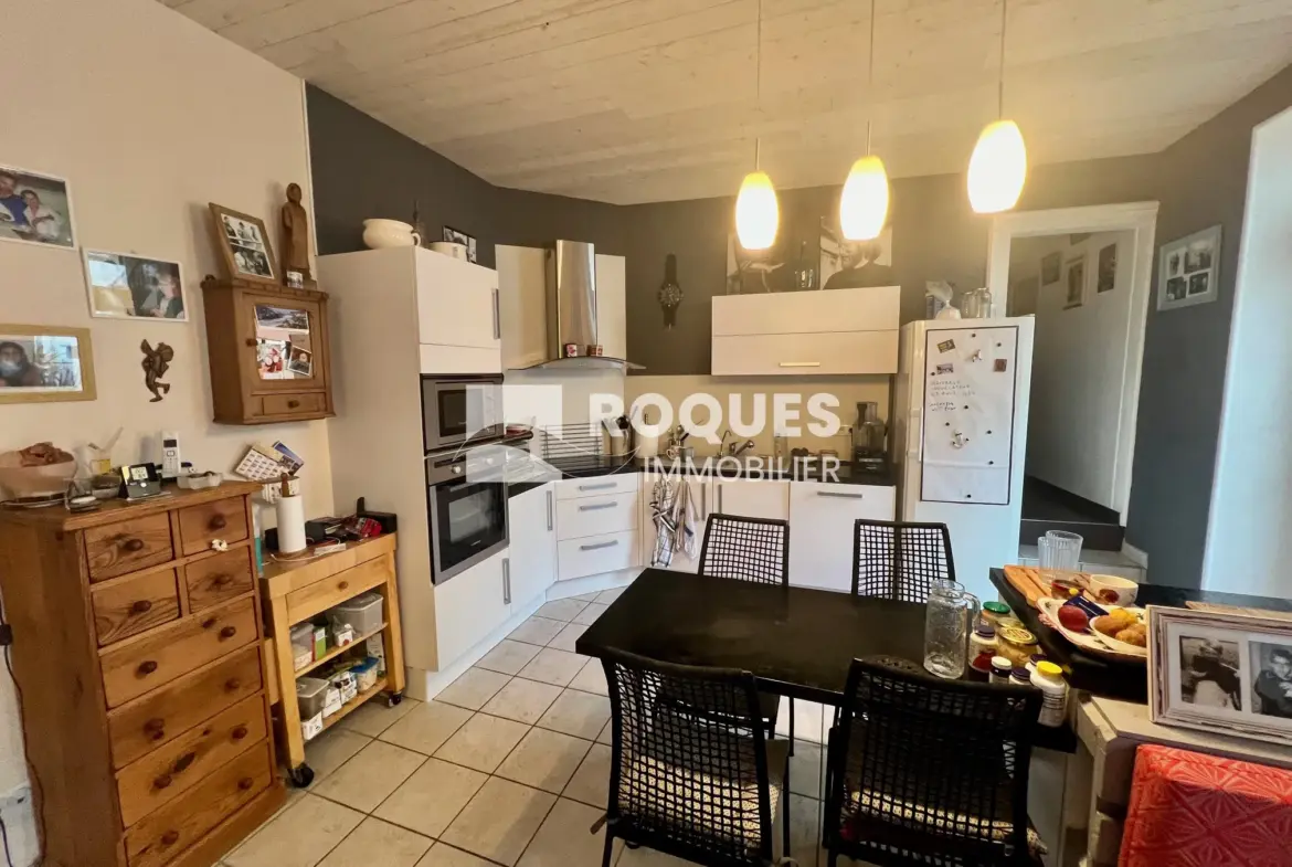 Appartement T4 rénové à Millau avec terrasses et cave 