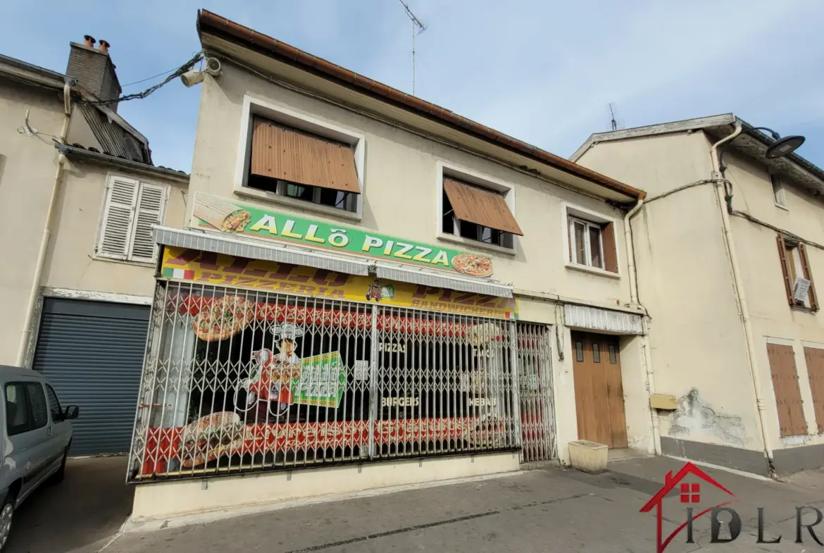 Immeuble d'investissement avec restaurant et appartement à Wassy 