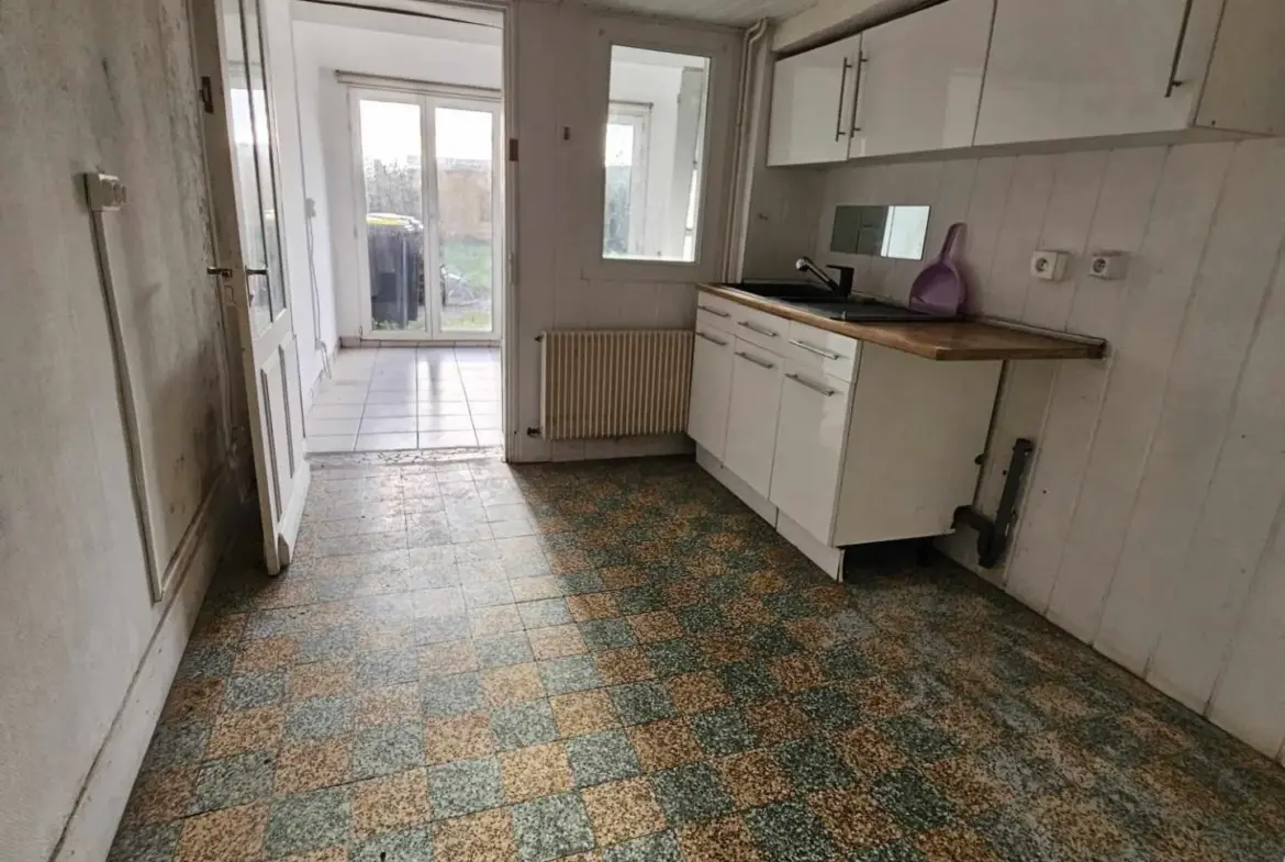 À vendre : Maison de ville à Oisemont avec jardin 