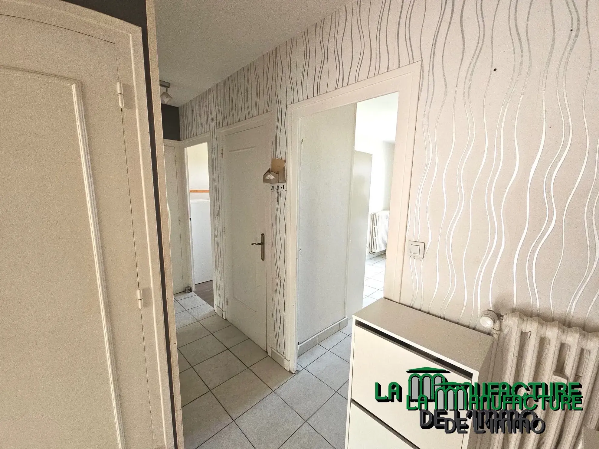 À vendre : Appartement F3 traversant avec garage à Saint-Étienne 