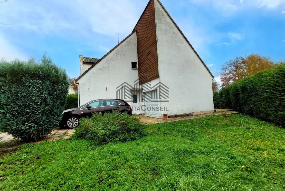 Maison atypique avec jardin à Oissel à vendre 