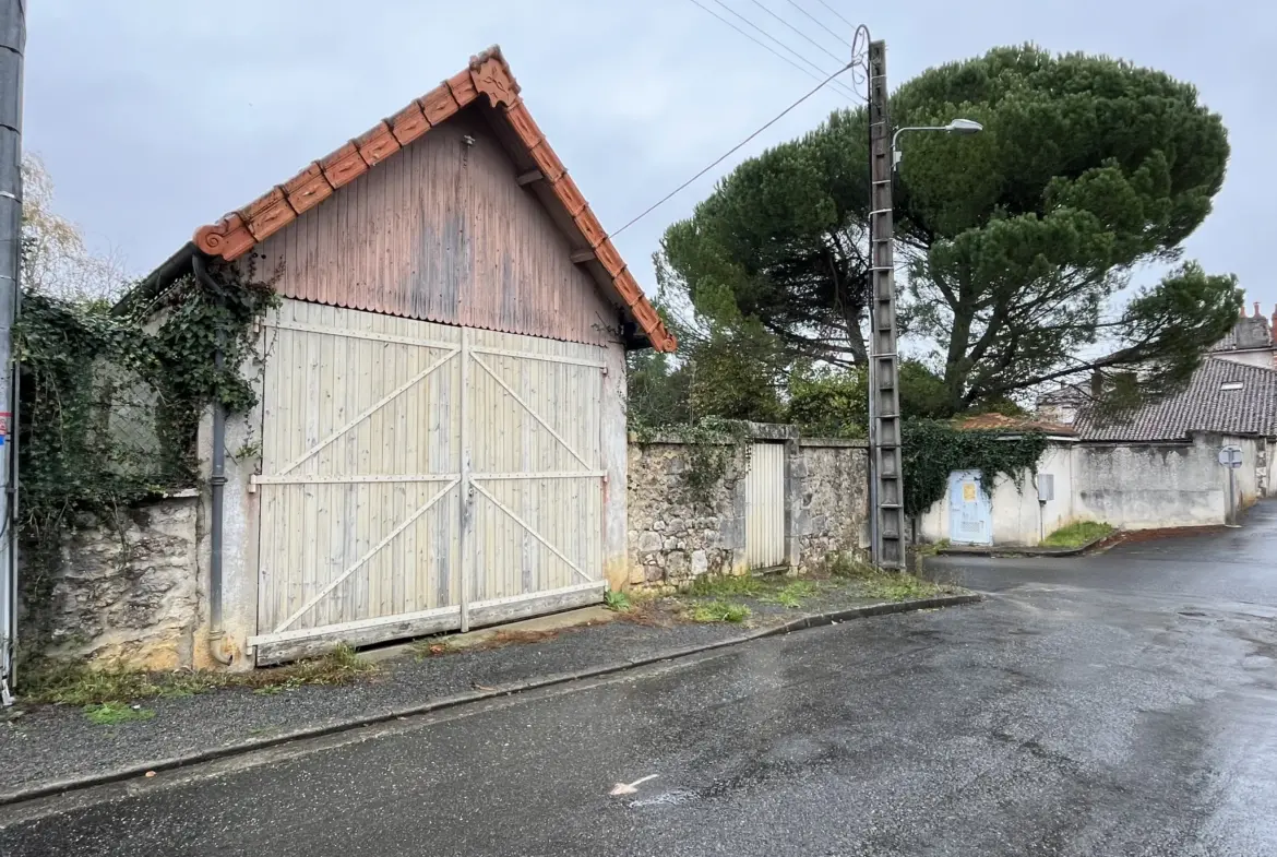 Terrain à bâtir avec garage à Montbron 