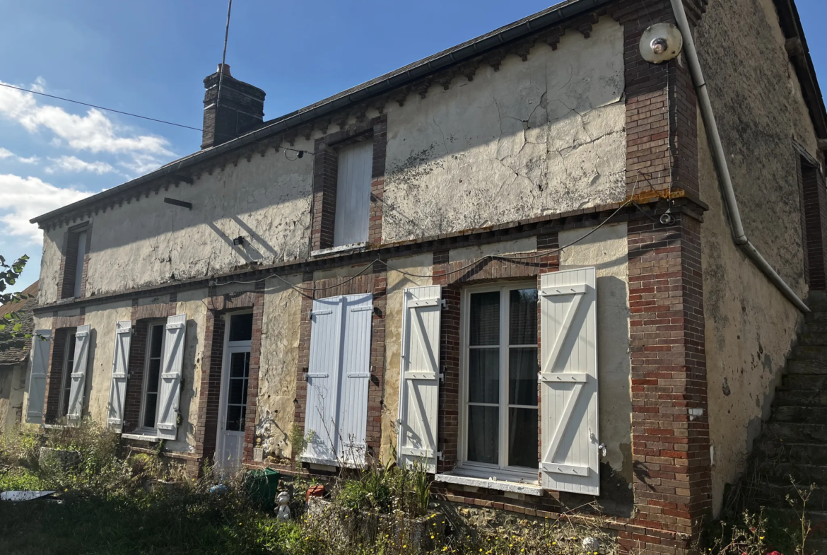 Maison à rénover à Pacy-sur-Eure sur grand terrain 