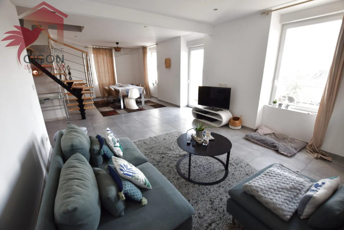 À vendre : Appartement contemporain avec terrasse et jardin à Montbéliard 