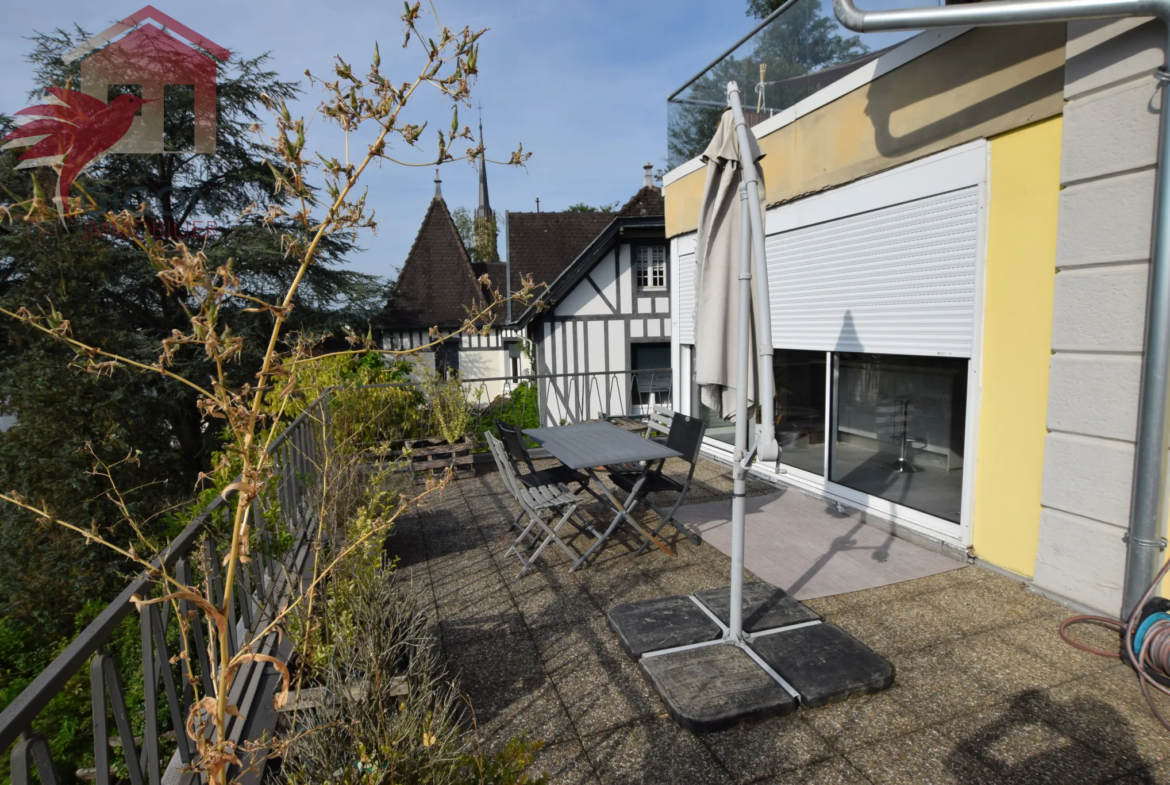 À vendre : Appartement contemporain avec terrasse et jardin à Montbéliard 