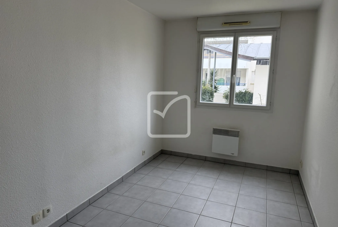 Appartement T3 à vendre à Poitiers - Résidence sécurisée avec balcon et parking 