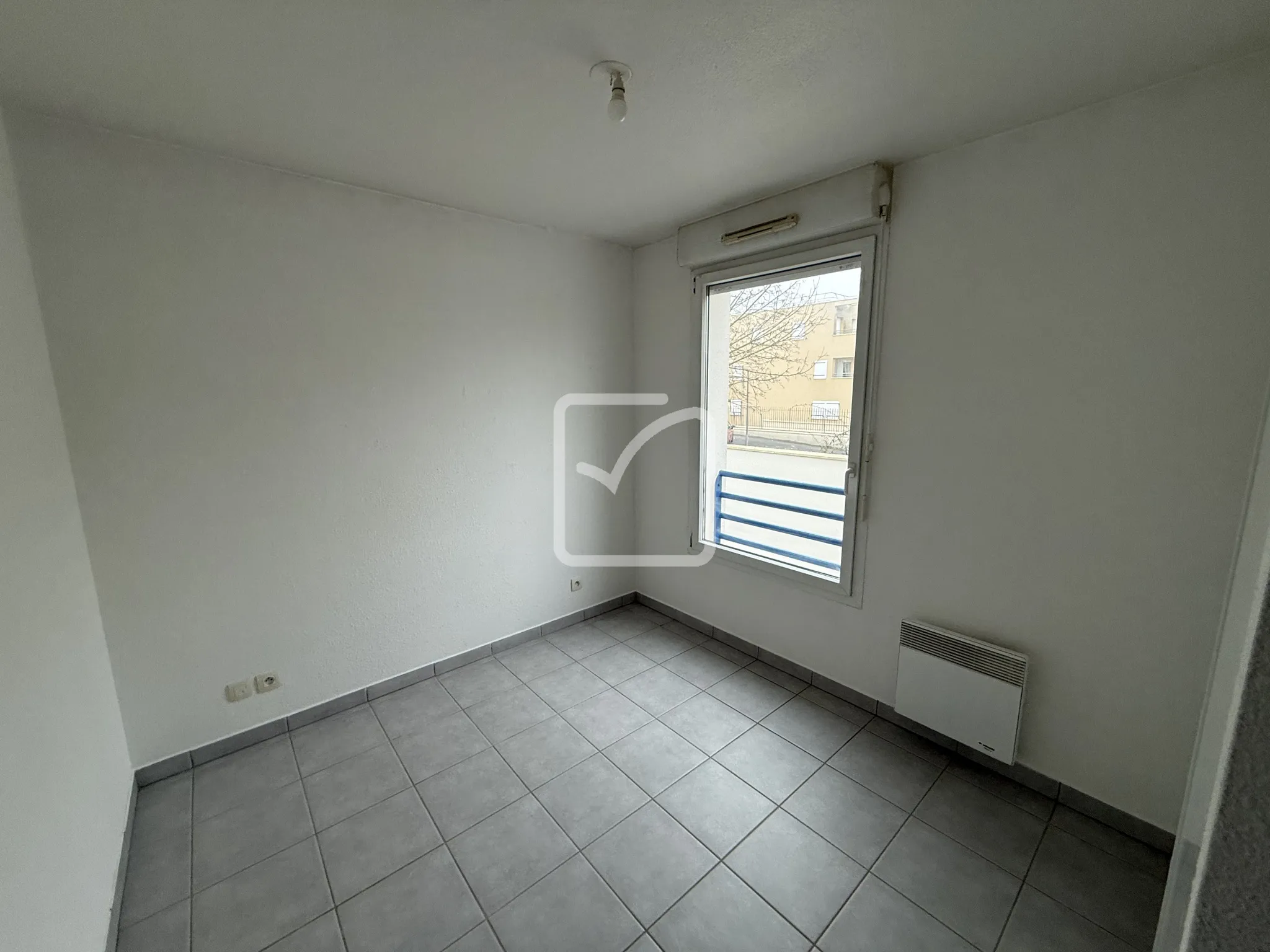 Appartement T3 à vendre à Poitiers - Résidence sécurisée avec balcon et parking 