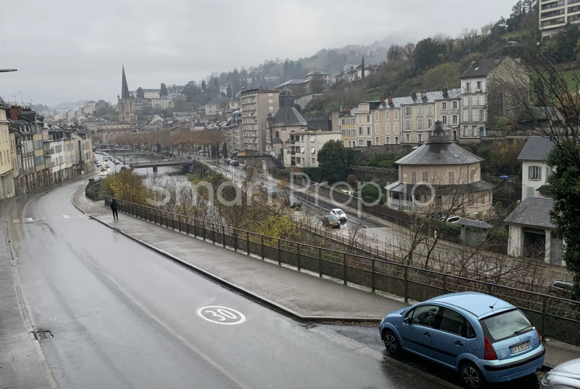 Maison à vendre à Tulle - 97 m² avec jardin et garages privatifs 