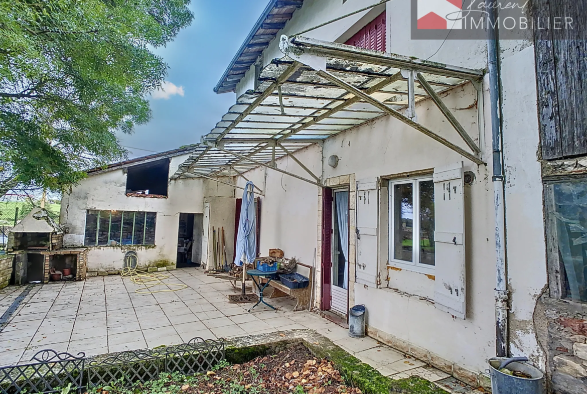 Grande maison avec jardin et dépendances à vendre près de Pont-de-Vaux 