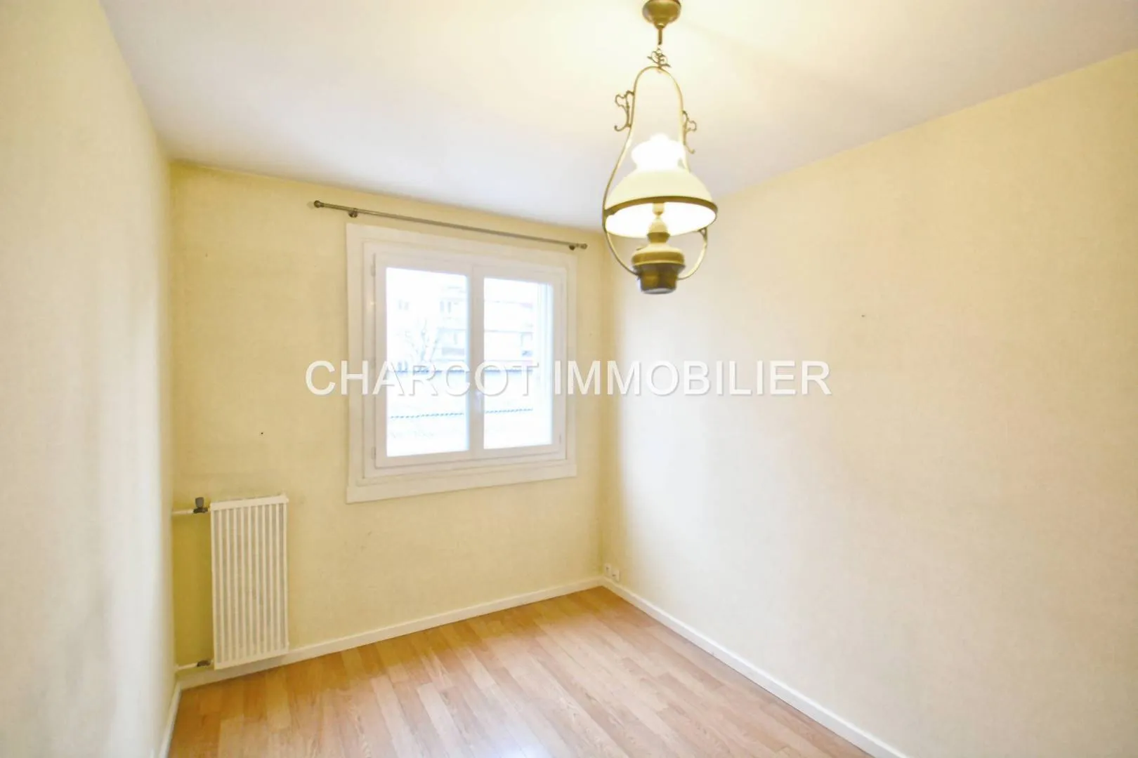 À vendre : Appartement T4 avec balcon, cave et garage à Sainte Foy-lès-Lyon 