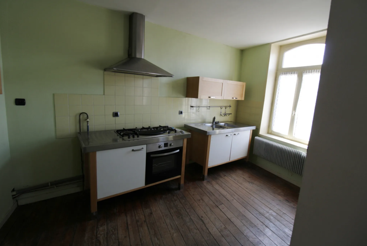 Maison 180 m² avec studio loué et appartement libre à Lievin 