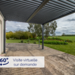 Maison contemporaine à Champdolent avec jardin paysager