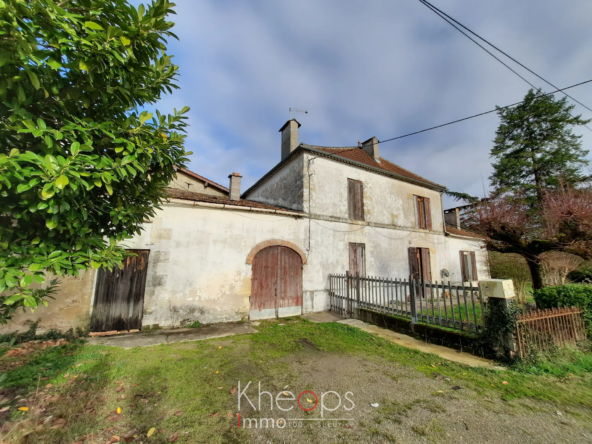 Maison spacieuse avec dépendances et jardin à Lamothe-Landerron