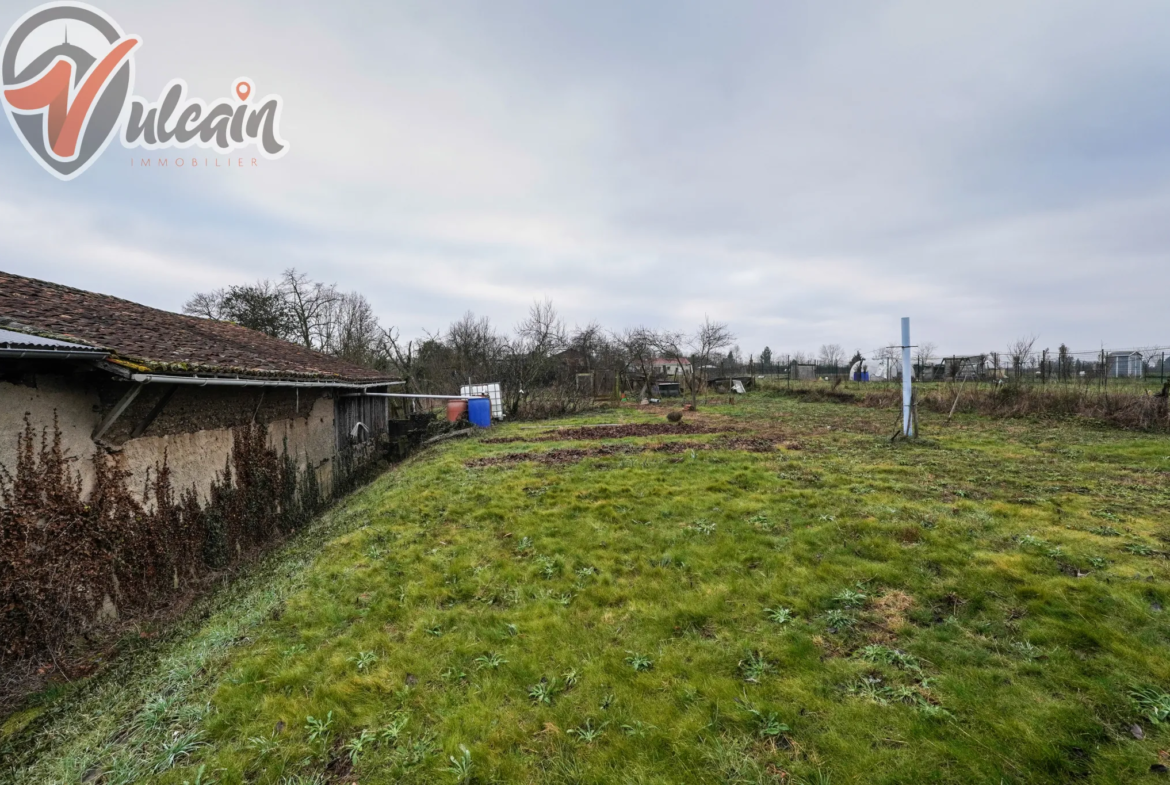 Maison de ville sur 1150 m² de terrain à Maringues 