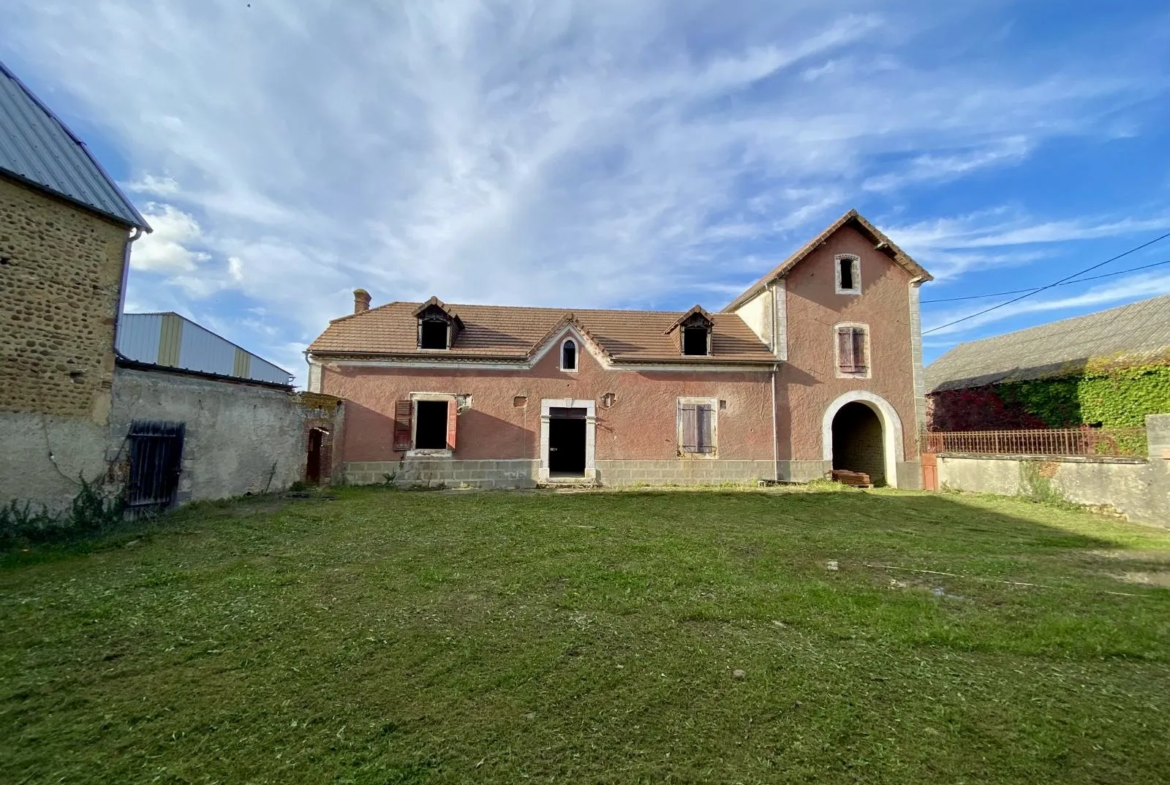 Maison en galets à rénover entièrement à Momy 