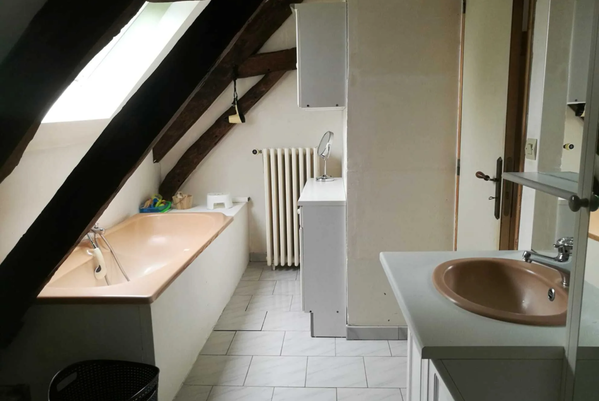 Maison spacieuse à vendre à Hauterive avec 4 chambres et vaste terrain 