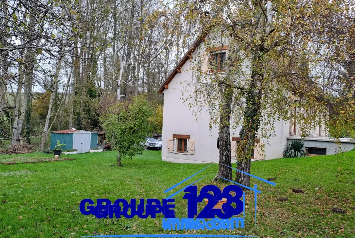 Maison familiale à Fleury-la-Vallée avec jardin arboré 