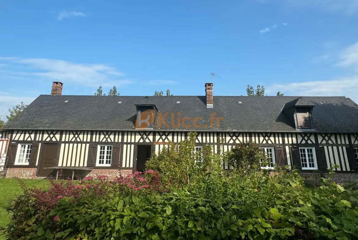 Longère rénovée 6 chambres avec jardin et garage à Luneray 