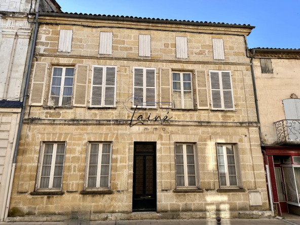 Maison en pierres à Sainte-Foy-la-Grande avec jardin et potentiel de rénovation