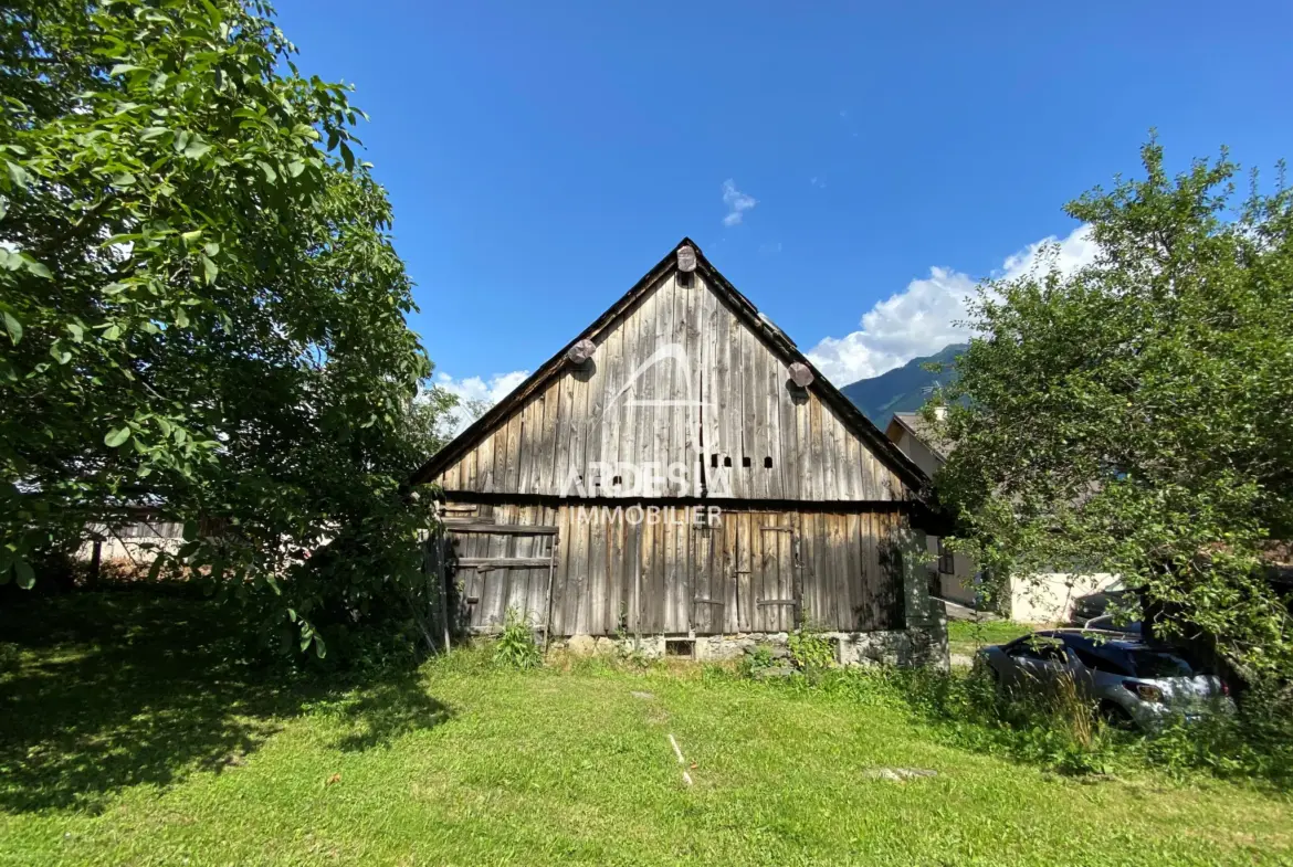 Terrain constructible de 600 m² à St Alban des Hurtieres avec dépendance 