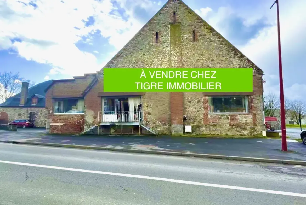 Opportunité exceptionnelle : Immeuble polyvalent de 900m² avec parking à Bavay 