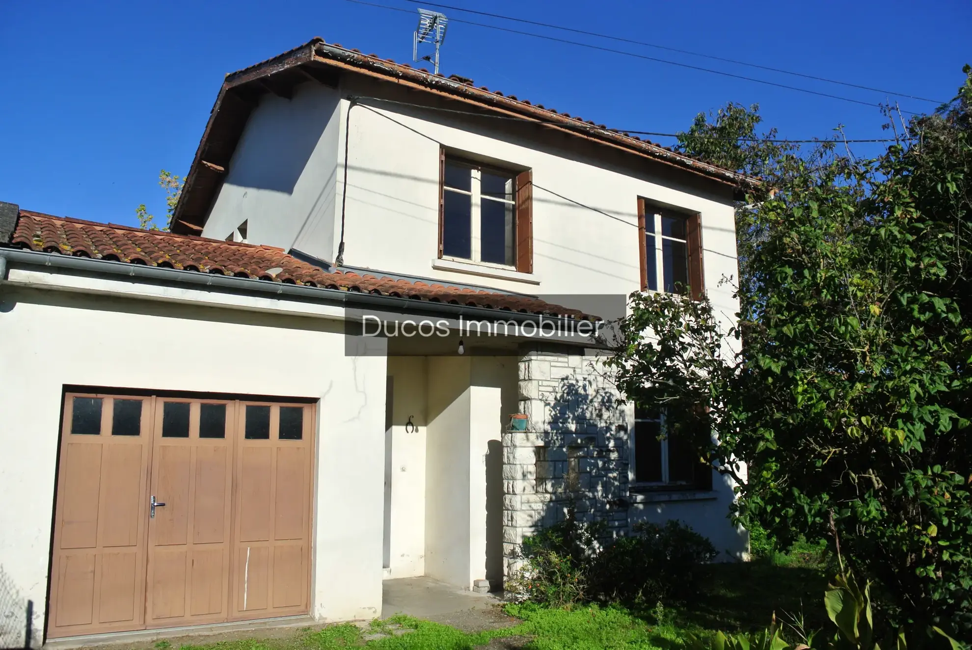 Maison à Marmande avec garage et jardin à rénover 