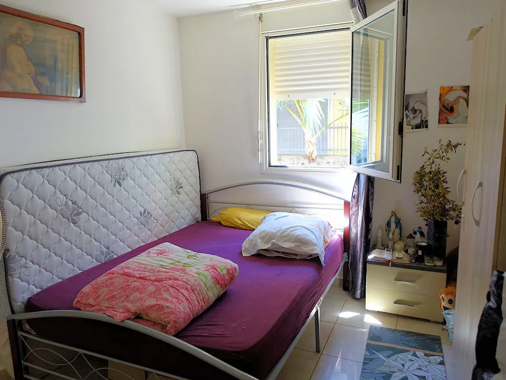 À vendre : Appartement T2 de 45 m² à Sainte Clotilde avec parking 