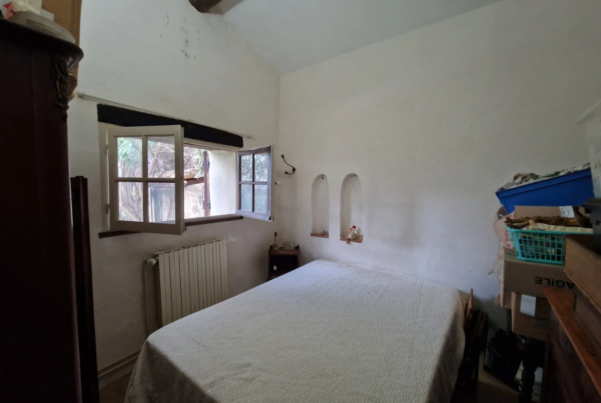 Maison de village à vendre à Aujargues avec jardin et terrasse 