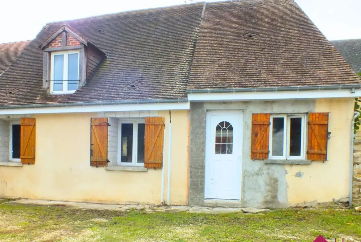 Maison à rénover avec jardin à Nérondes, près des commerces 