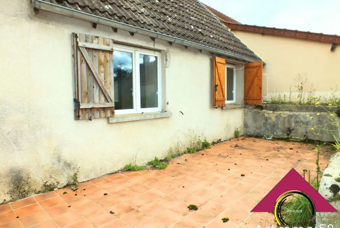 Maison à rénover avec jardin à Nérondes, près des commerces 