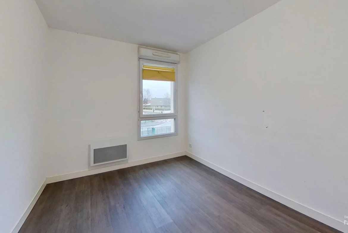 Appartement 3 pièces avec balcon et deux places de parking à Douvres la Délivrande 